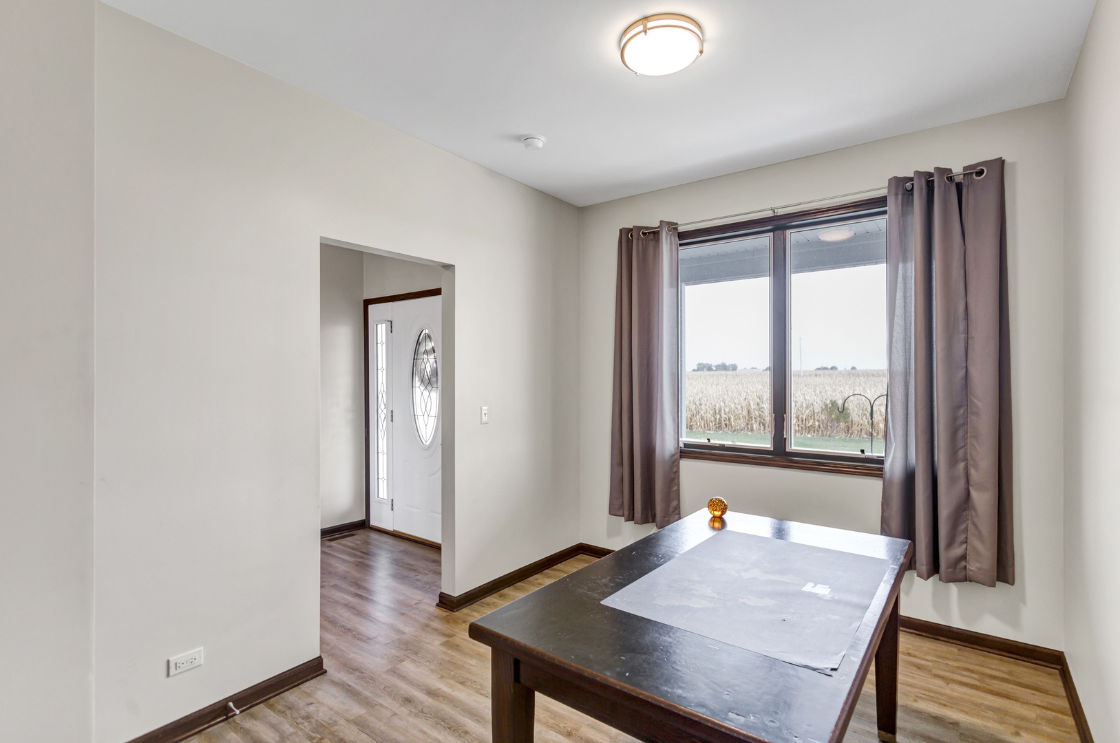 34765 Jefferson Road Genoa, IL 60135 - Photo 18 of 65 a view of a room with furniture and wooden floor