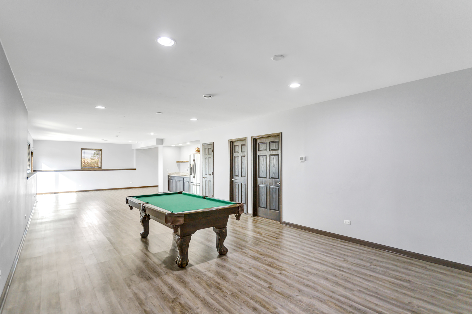 34765 Jefferson Road Genoa, IL 60135 - Photo 42 of 65 a room with wooden floor and pool table
