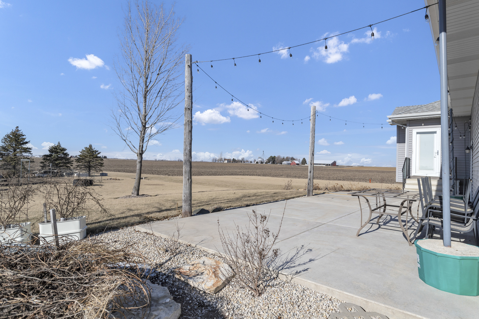 34765 Jefferson Road Genoa, IL 60135 - Photo 50 of 65 a view of a terrace with lawn chairs