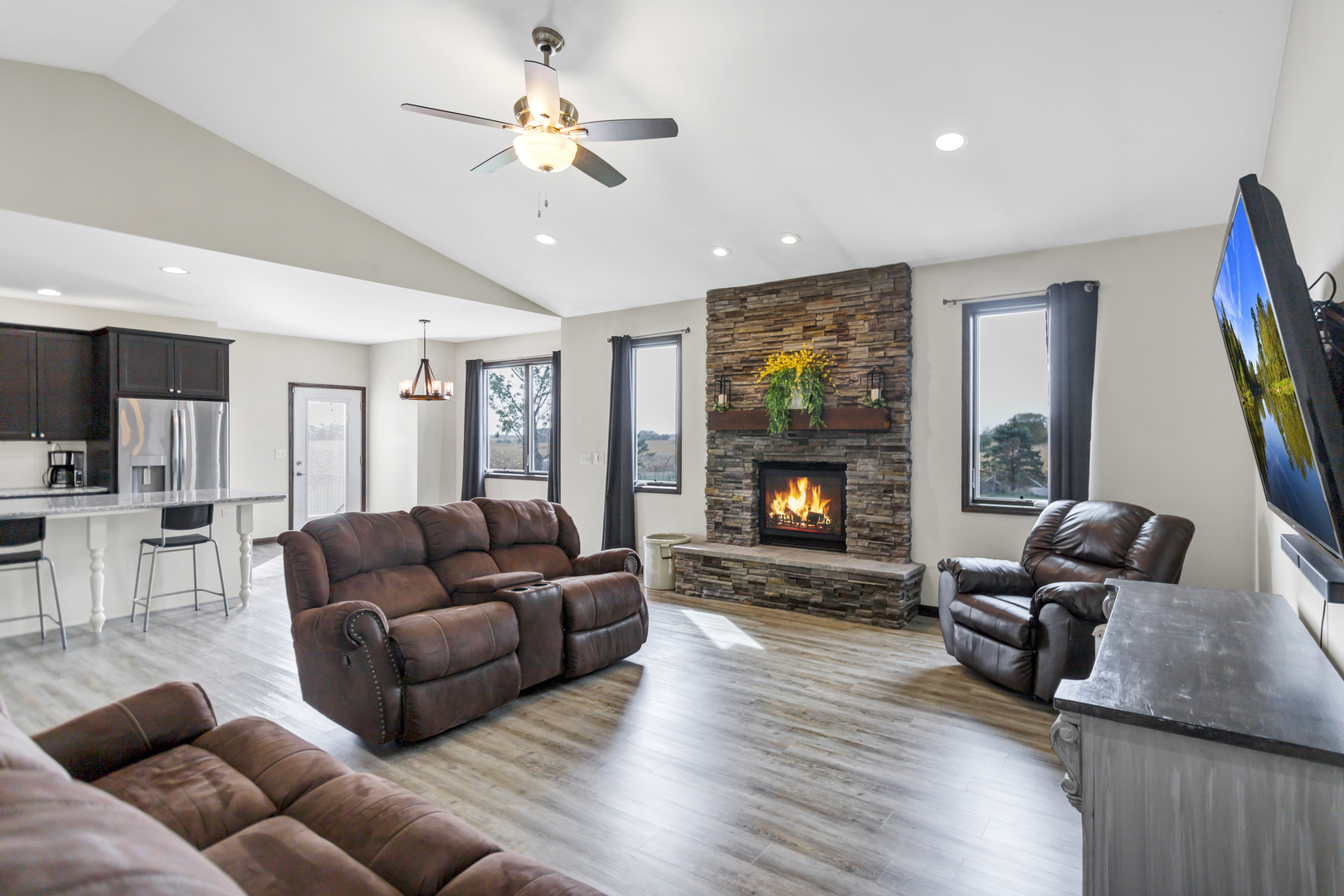 34765 Jefferson Road Genoa, IL 60135 - Photo 8 of 65 a living room with furniture and a fireplace