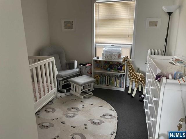 823 Anderson Avenue, Unit 2 Fort Lee, NJ 07024 - Photo 7 of 23 a living room with furniture fireplace and window
