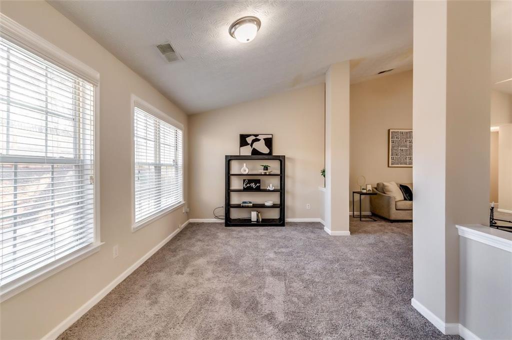 5602 Swanson Road Ellenwood, GA 30294 - Photo 17 of 36 a view of an empty room and window