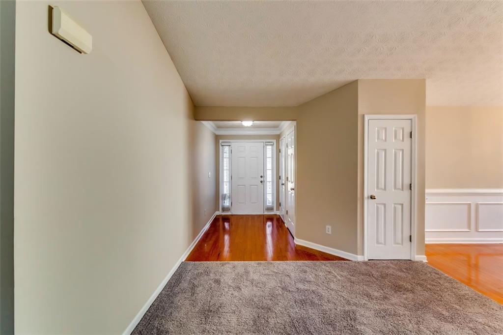 5602 Swanson Road Ellenwood, GA 30294 - Photo 3 of 36 a view of a kitchen with a sink and dishwasher