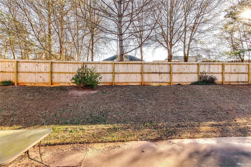 5602 Swanson Road Ellenwood, GA 30294 - Photo 35 of 36 a view of a backyard
