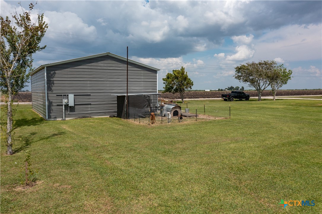 2507 Boyd Road Port Lavaca, TX 77979 - Photo 14 of 47 a view of a house with a backyard