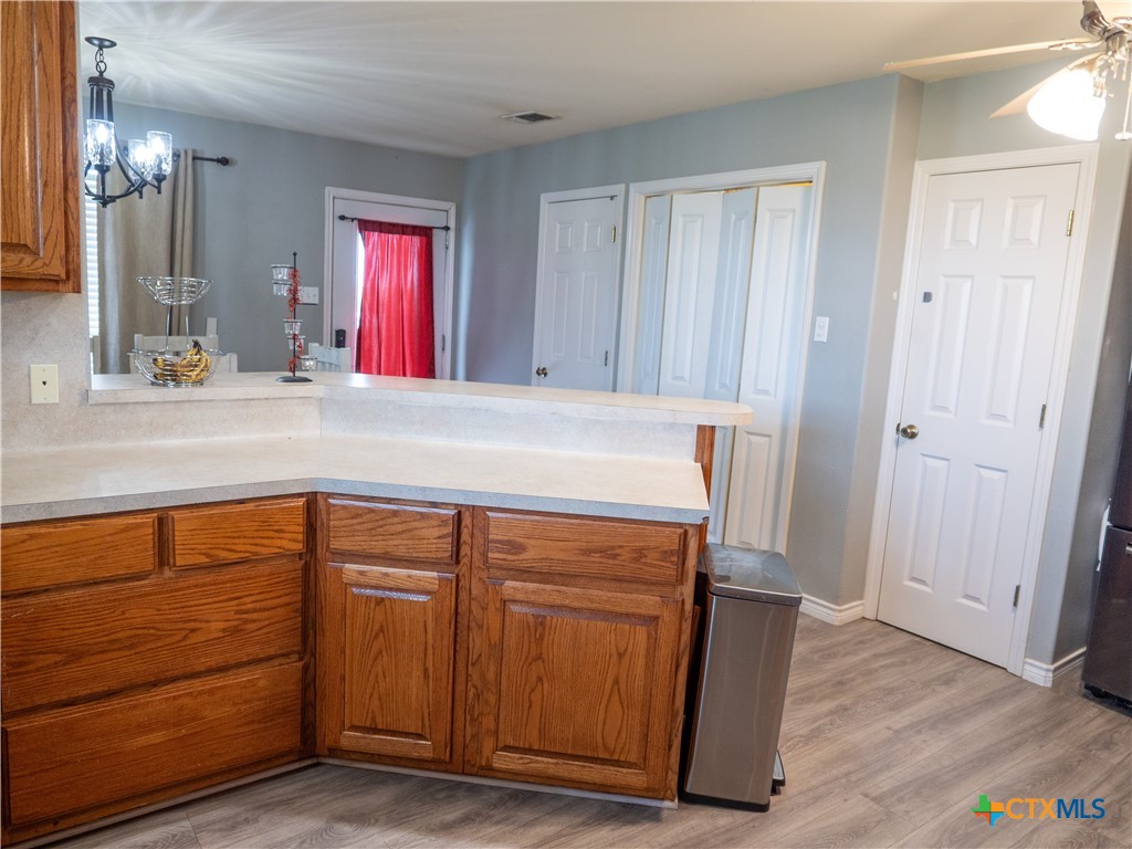2507 Boyd Road Port Lavaca, TX 77979 - Photo 18 of 47 a room with granite countertop cabinets and a dresser