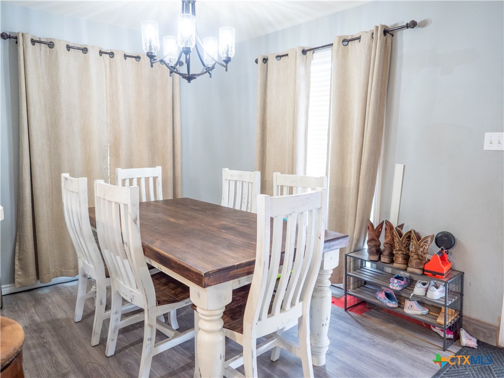 2507 Boyd Road Port Lavaca, TX 77979 - Photo 20 of 47 a view of a dining room with furniture window and wooden floor