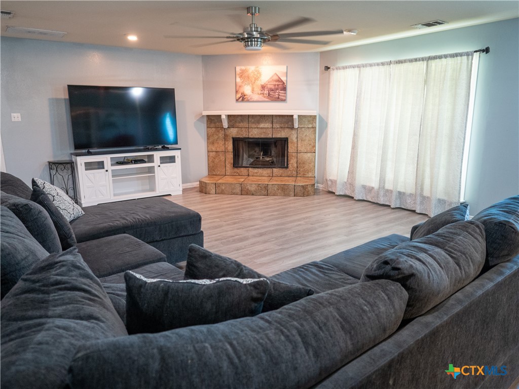 2507 Boyd Road Port Lavaca, TX 77979 - Photo 21 of 47 a living room with furniture and a flat screen tv
