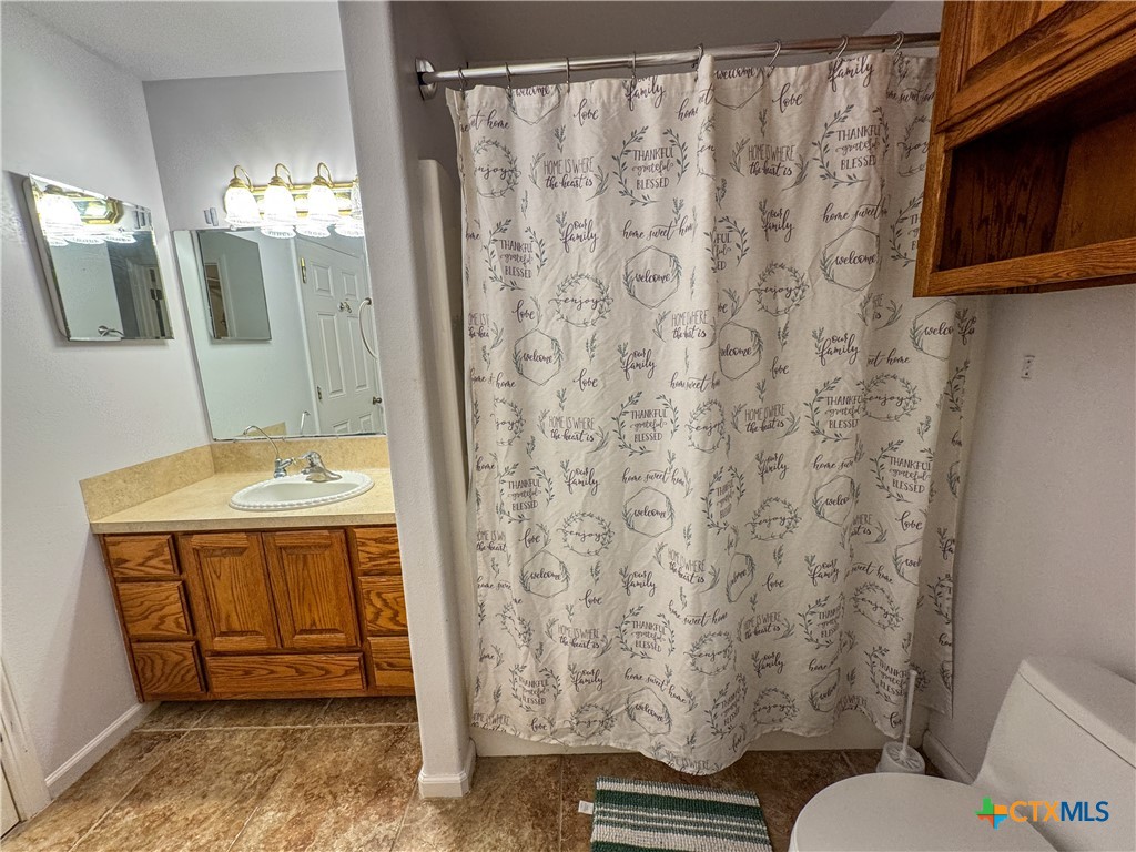 2507 Boyd Road Port Lavaca, TX 77979 - Photo 32 of 47 a bathroom with a sink toilet and shower