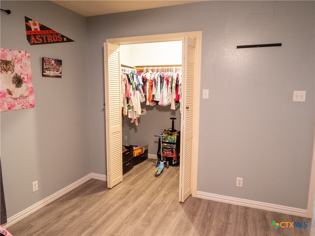 2507 Boyd Road Port Lavaca, TX 77979 - Photo 34 of 47 a view of a livingroom with wooden floor and a window