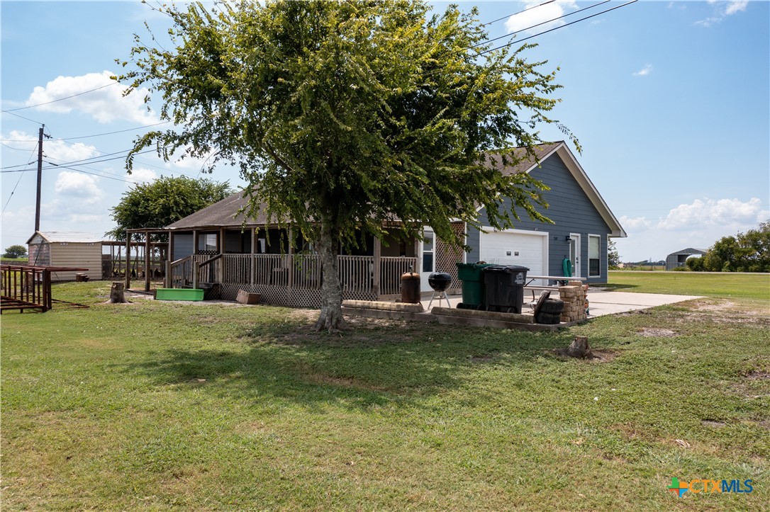 2507 Boyd Road Port Lavaca, TX 77979 - Photo 5 of 47 a view of a house with backyard and sitting area