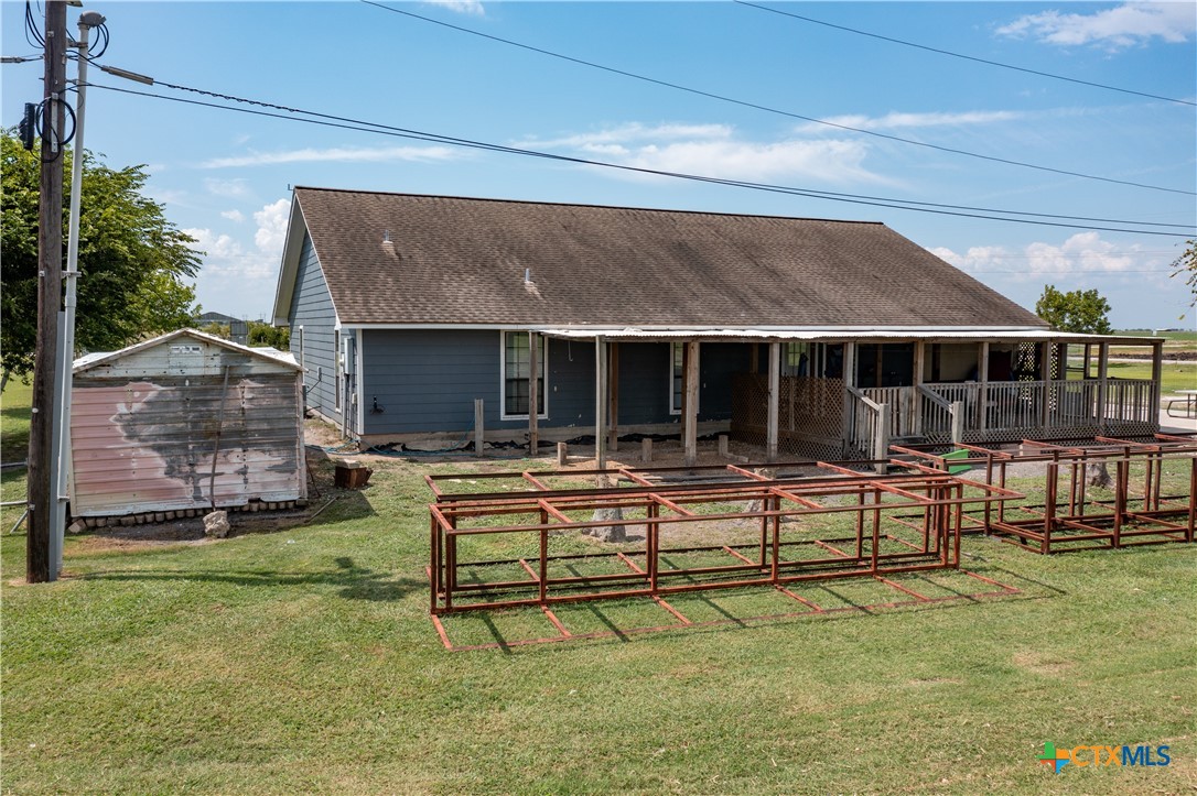 2507 Boyd Road Port Lavaca, TX 77979 - Photo 9 of 47 a view of a house with backyard porch and sitting area