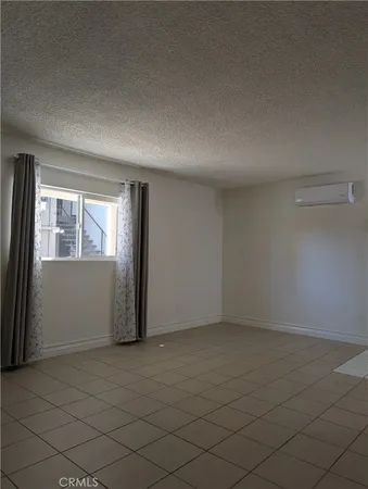 a bathroom with a toilet and a bath tub