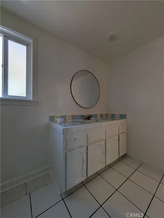 a bathroom with a bathtub and toilet