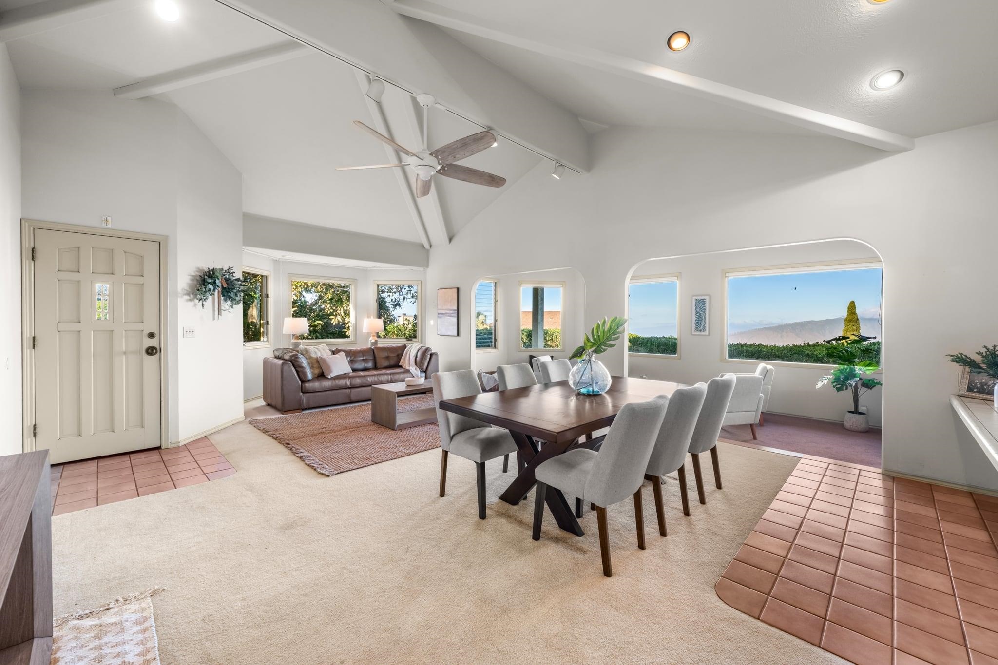 33 Puakea Place Kula, HI 96790 - Photo 4 of 48 a living room with lots of furniture and a large window