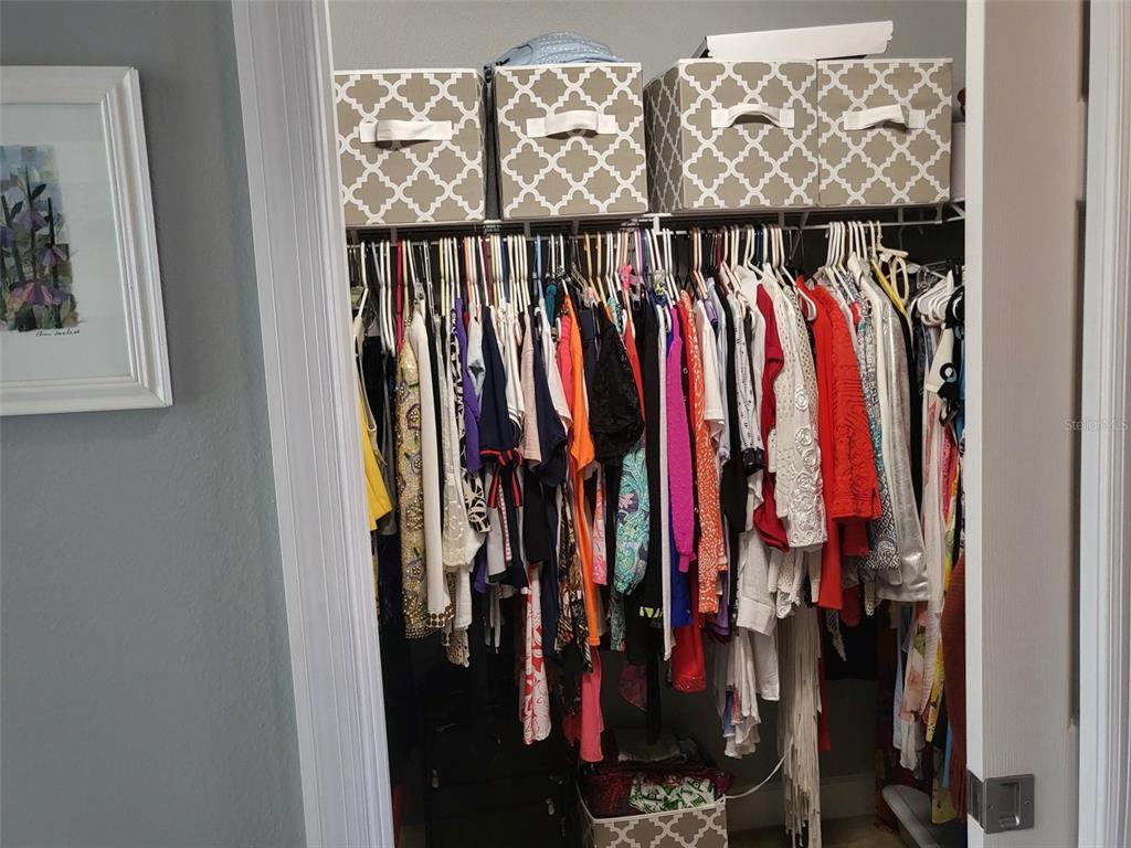 107 Wading Bird Drive Venice, FL 34292 - Photo 14 of 33 a view of walk in closet with clothes