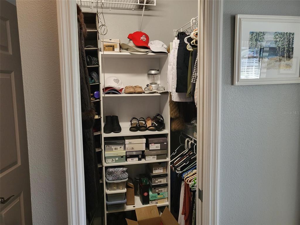 107 Wading Bird Drive Venice, FL 34292 - Photo 15 of 33 a view of a kitchen with fridge and rack