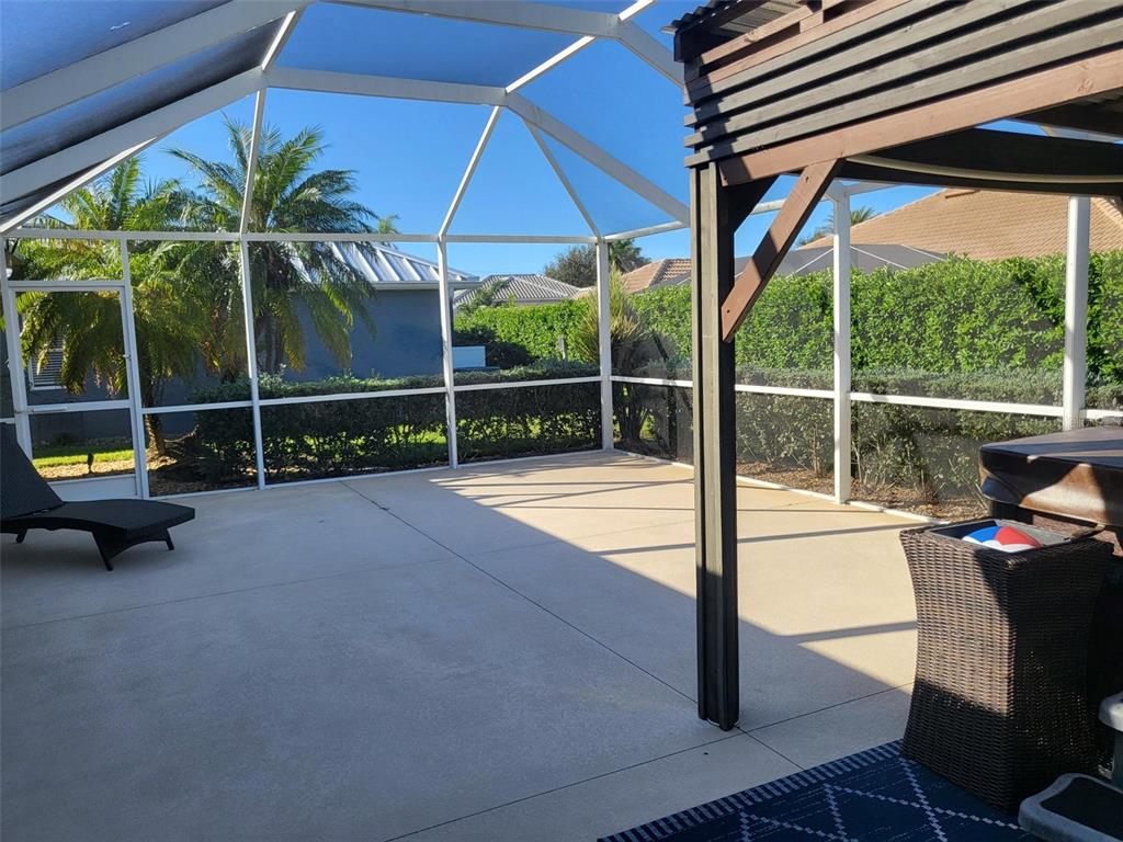 107 Wading Bird Drive Venice, FL 34292 - Photo 29 of 33 a view of a swimming pool with a porch