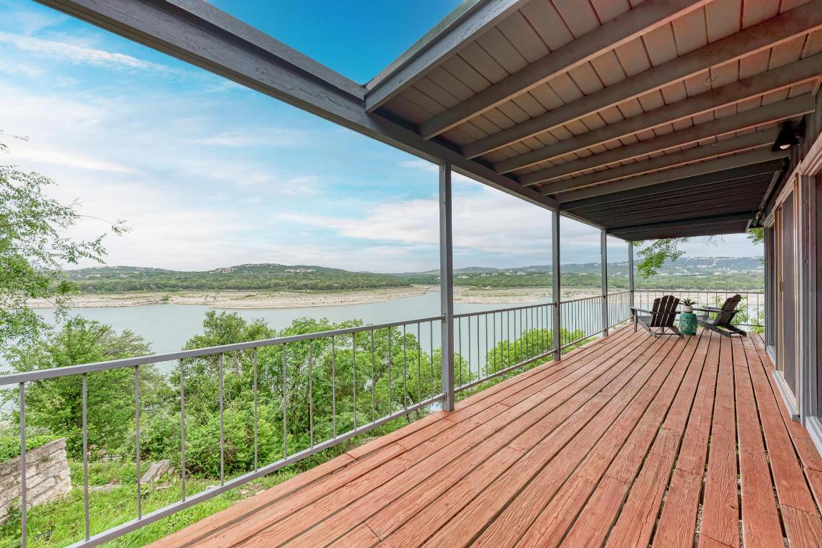 8130 Joy Road Volente, TX 78641 - Photo 28 of 36 Wooden terrace with a water view