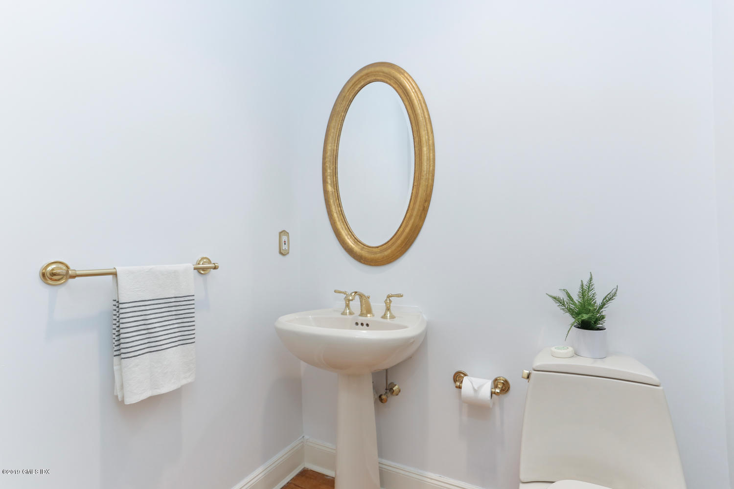 333 Palmer Hill Road, Unit 3C Riverside, CT 06878 - Photo 11 of 36 a bathroom with a sink a mirror and a window
