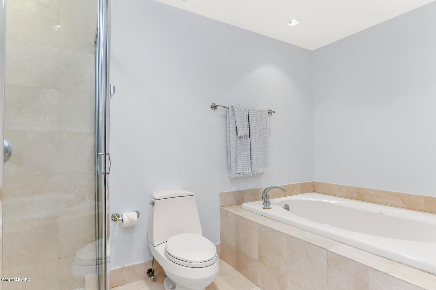 333 Palmer Hill Road, Unit 3C Riverside, CT 06878 - Photo 15 of 36 a white bath tub sitting next to a toilet