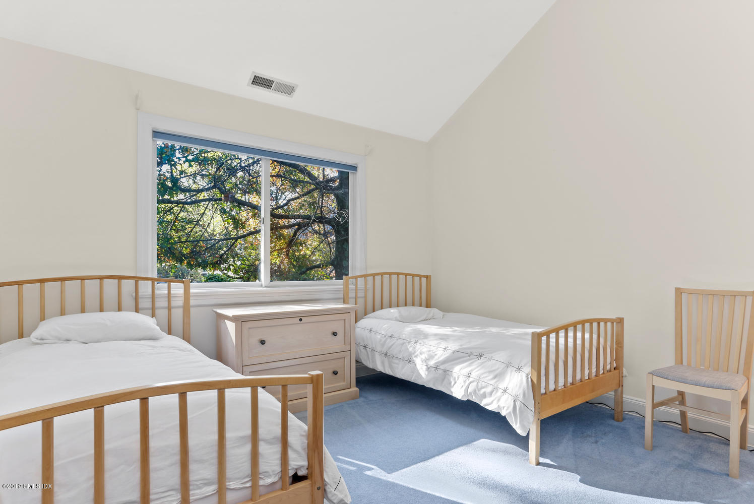 333 Palmer Hill Road, Unit 3C Riverside, CT 06878 - Photo 16 of 36 a bedroom with a bed and a window