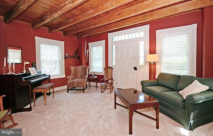 4012 Federal Hill Road Jarrettsville, MD 21084 - Photo 22 of 30 Stone wall and original front door in living room