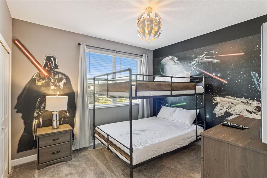 4378 Rhyme Street Kissimmee, FL 34746 - Photo 19 of 41 a bedroom with a bed and window