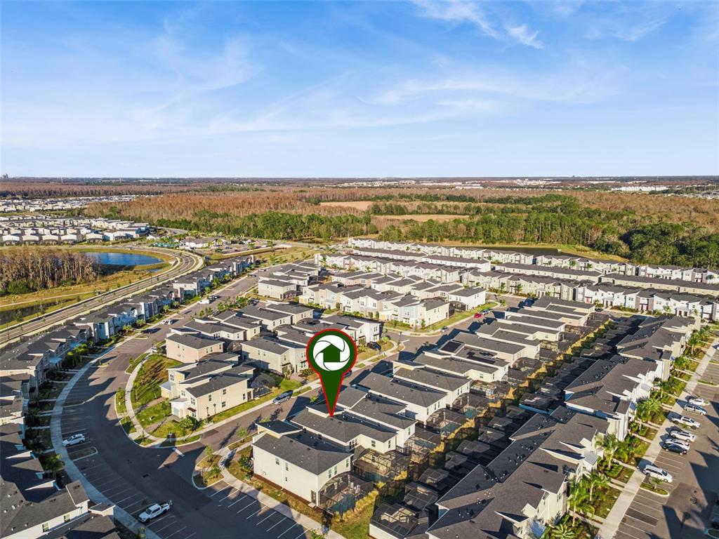 4378 Rhyme Street Kissimmee, FL 34746 - Photo 29 of 41 an aerial view of a house with a ocean view