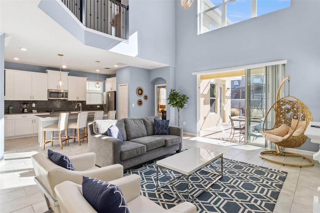 4378 Rhyme Street Kissimmee, FL 34746 - Photo 3 of 41 a living room with furniture and a large window