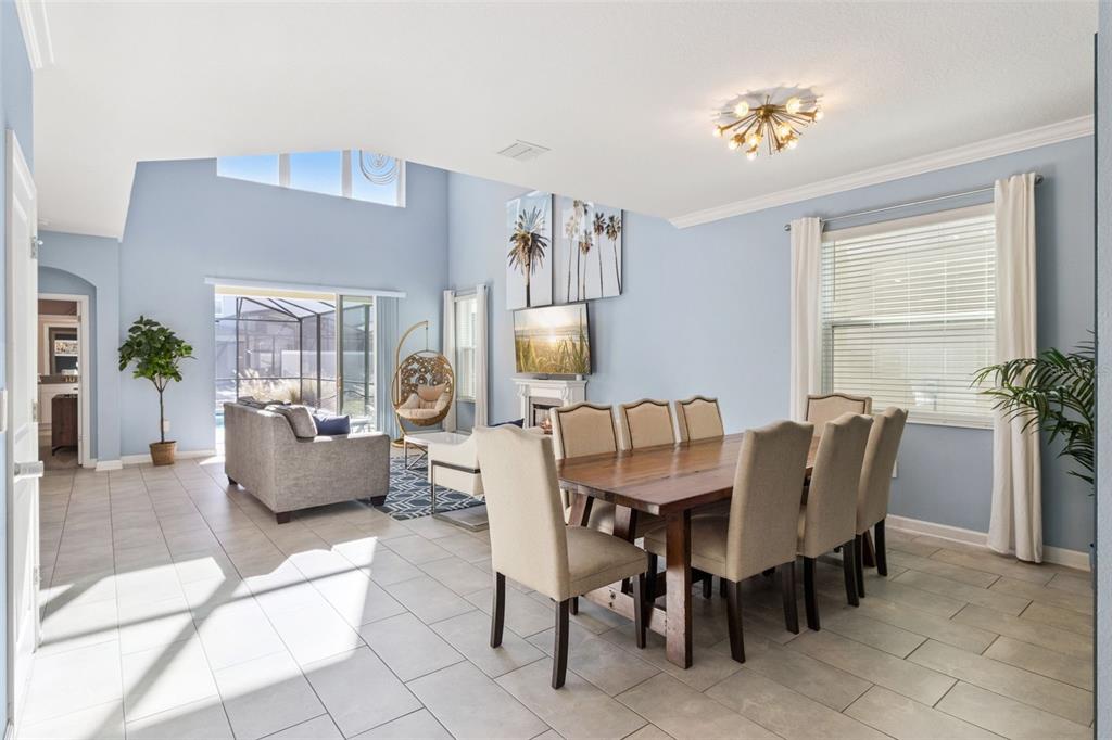 4378 Rhyme Street Kissimmee, FL 34746 - Photo 7 of 41 a view of a dining room with furniture