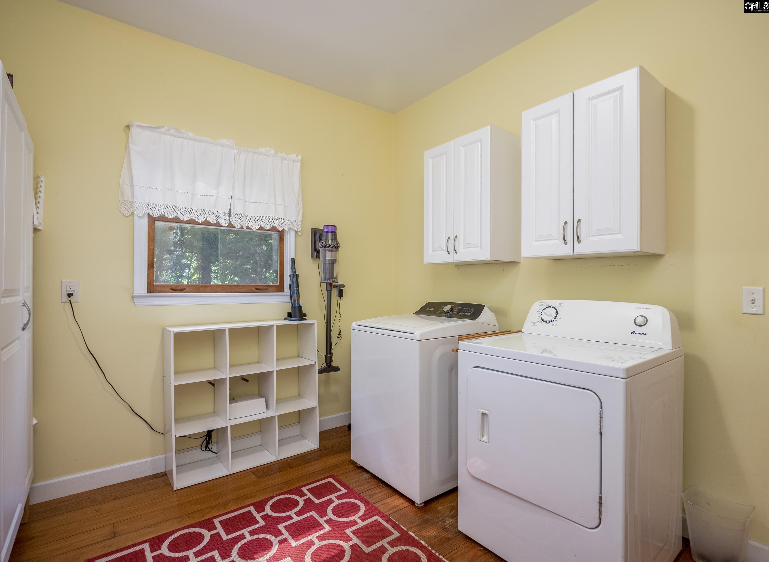2577 Harbor View Road Camden, SC 29020 - Photo 33 of 42 a view of storage and utility room with washer and dryer