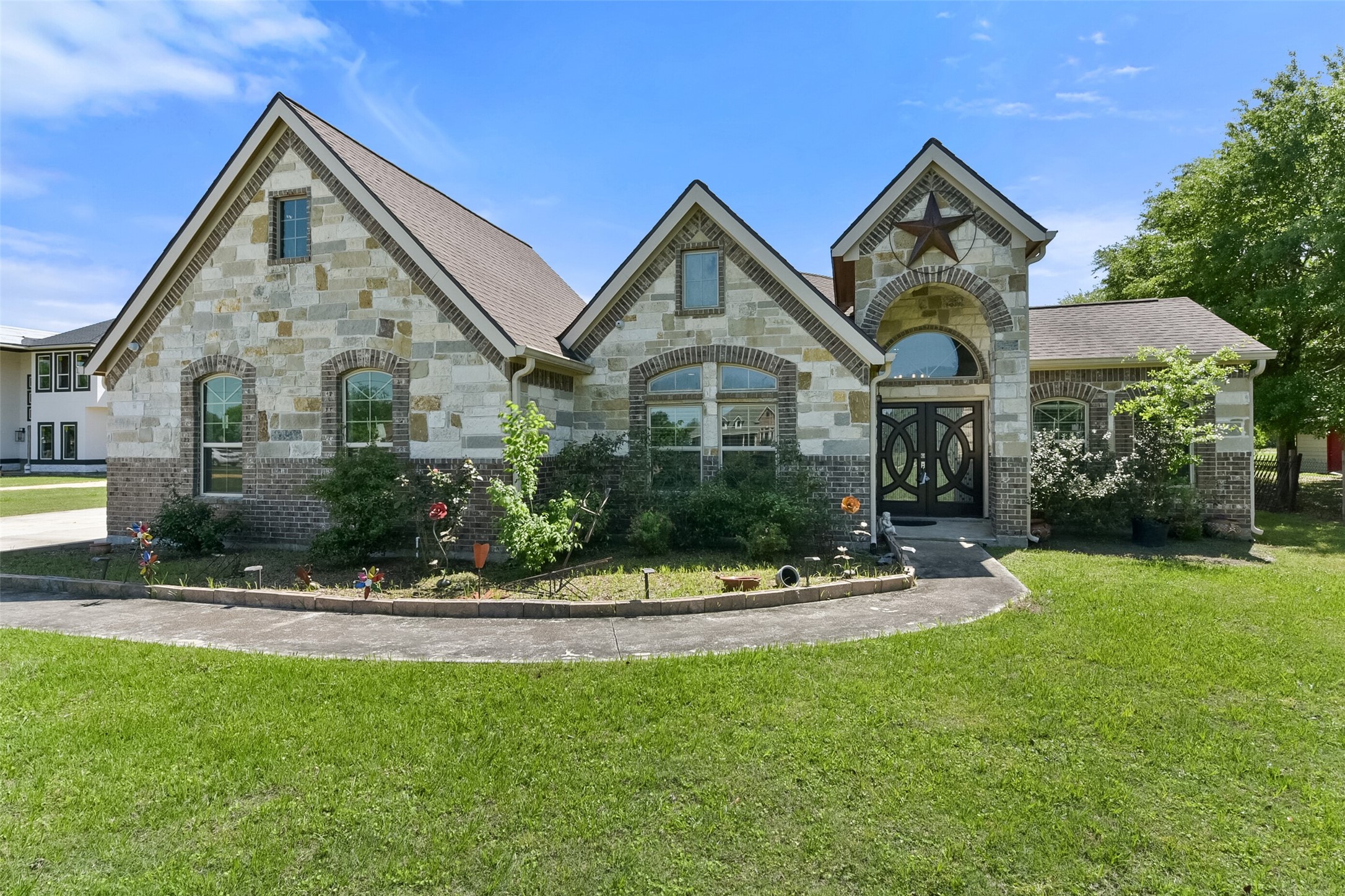 a front view of a house with a yard