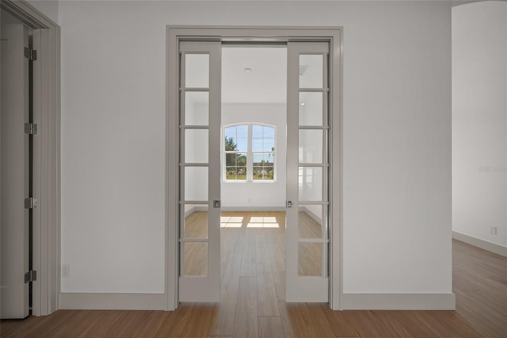 504 Gulf Street Venice, FL 34285 - Photo 16 of 47 a view of an entryway with wooden floor