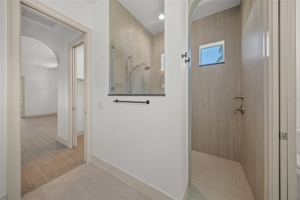 504 Gulf Street Venice, FL 34285 - Photo 21 of 47 a view of a bathroom from a hallway