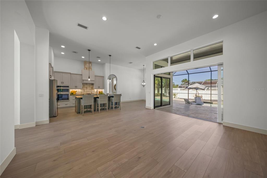 504 Gulf Street Venice, FL 34285 - Photo 7 of 47 a living room with furniture and a large window
