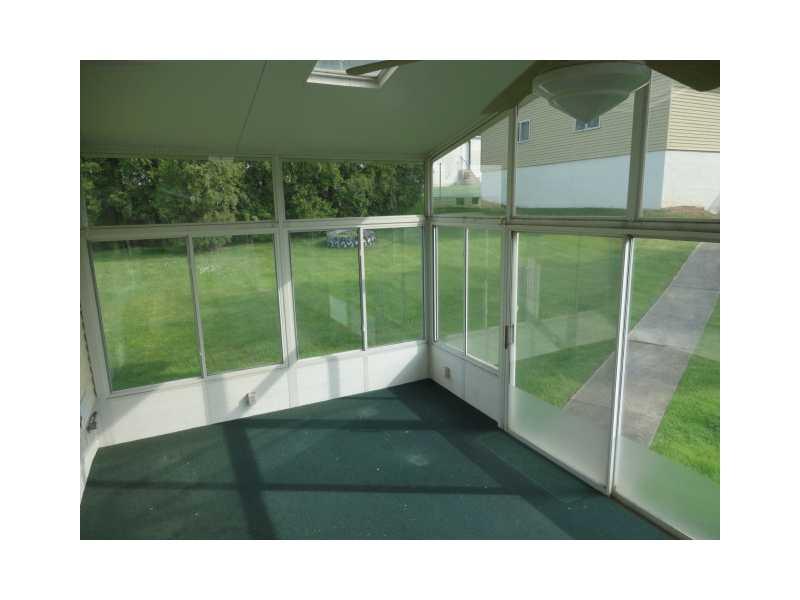 751 Virginia Avenue Rochester, PA 15074 - Photo 2 of 14 Sunroom. Enclosed sunporch for all your get togethers and celebrations!