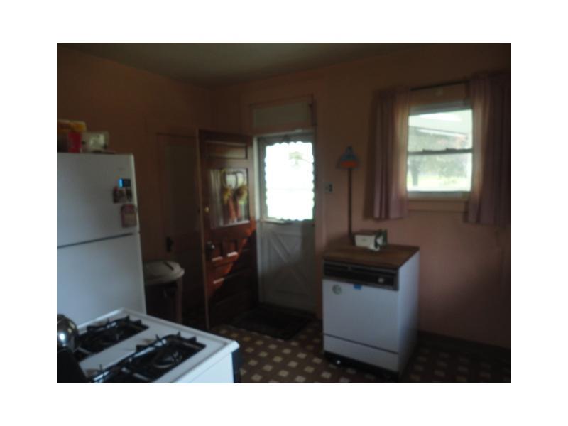751 Virginia Avenue Rochester, PA 15074 - Photo 6 of 14 Kitchen. Kitchen opens up into the sunporch area - usuable as is with all appliances remaining