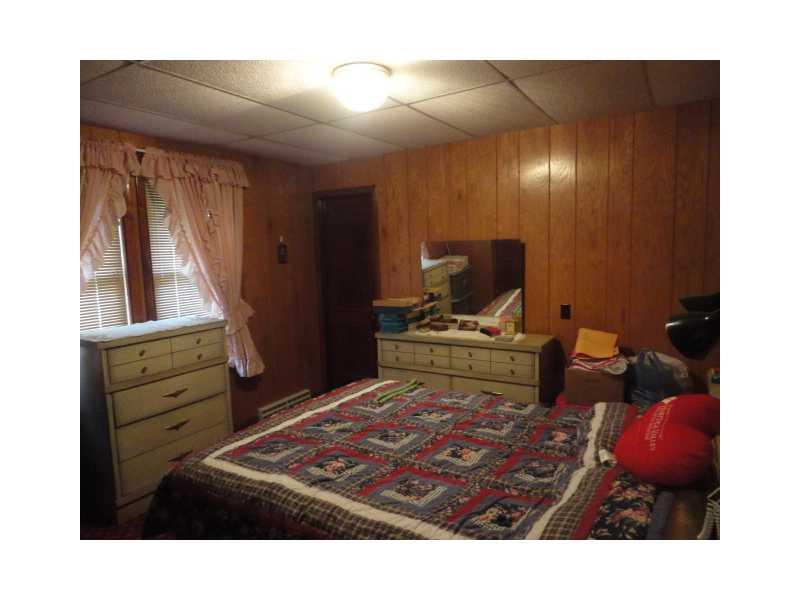 751 Virginia Avenue Rochester, PA 15074 - Photo 7 of 14 Master Bedroom. Paneled walls - and carpeted - good closet space