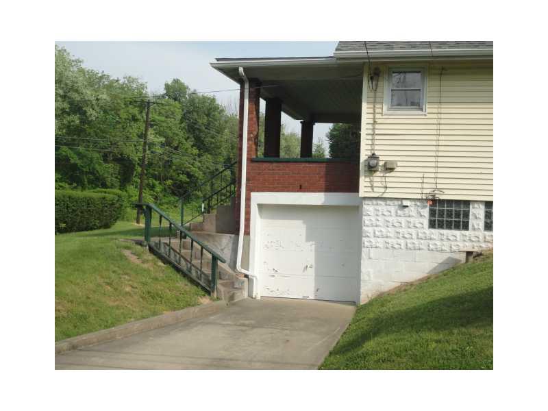 751 Virginia Avenue Rochester, PA 15074 - Photo 10 of 14 Parking Lot/Garage. Additional integral garage space with concrete drive