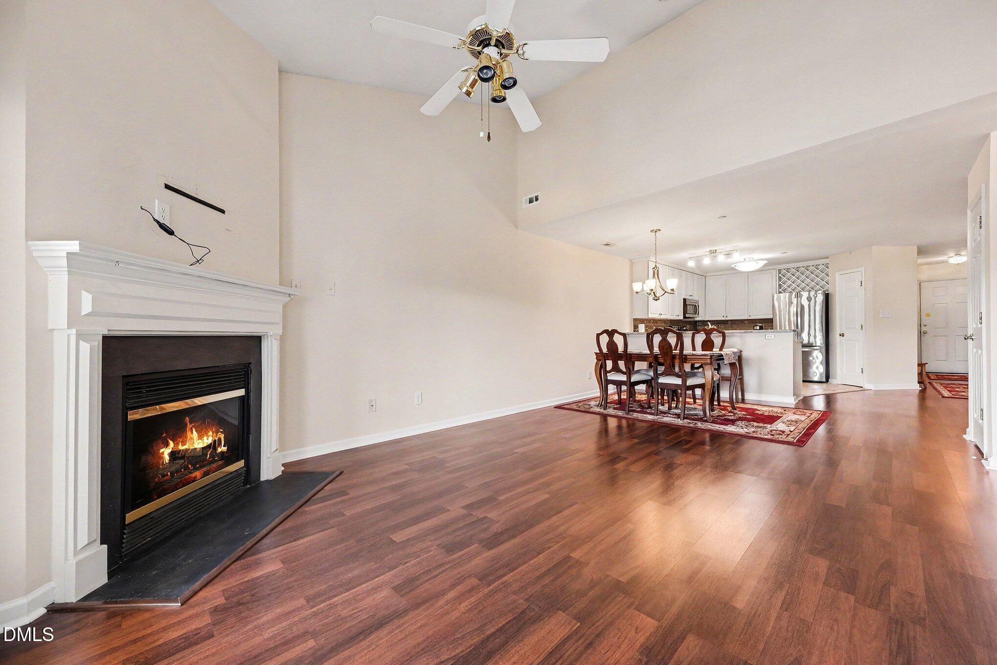 132 Springfork Drive Cary, NC 27513 - Photo 12 of 28 a living room with furniture and a fireplace