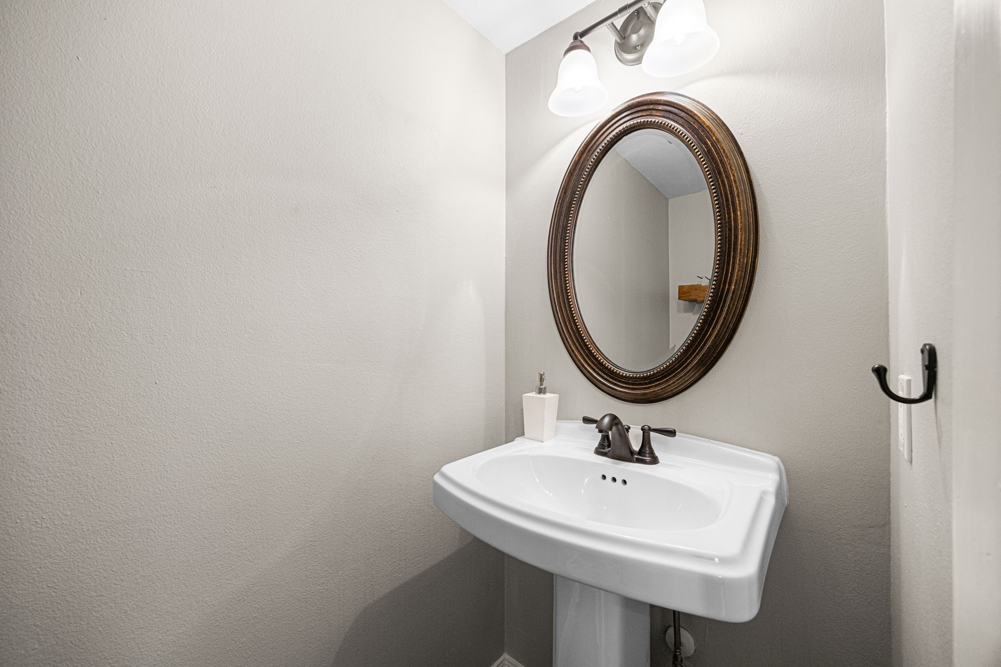 1300 Fairview Street, Unit B Houston, TX 77006 - Photo 10 of 28 Downstairs powder bathroom, in addition to the 2 full bathrooms upstairs.