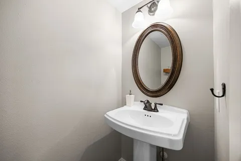 a area with wooden floor and furniture