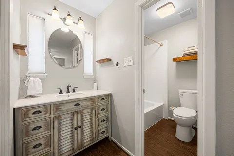 a white bath tub sitting in a bathroom