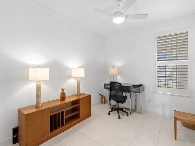 a view of a workspace with furniture