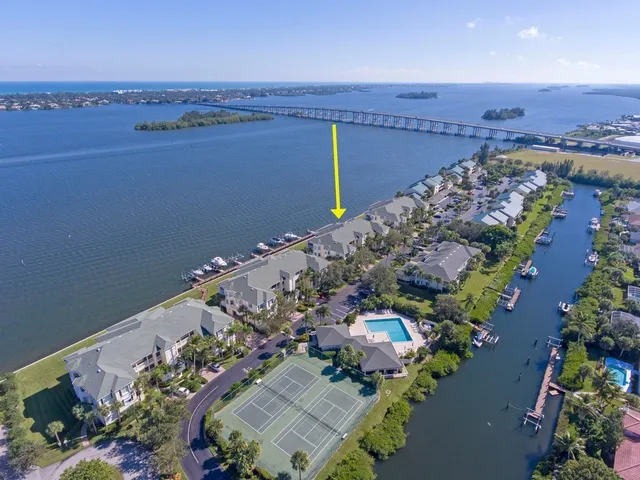an aerial view of a house with a garden
