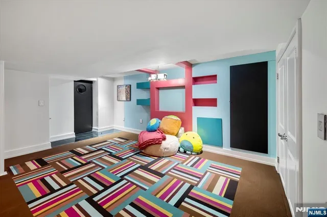 a bedroom with bed and a window