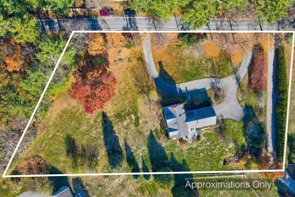 51 Green Road Bolton, MA 01740 - Photo 25 of 25 an aerial view of residential house with outdoor space and trees all around