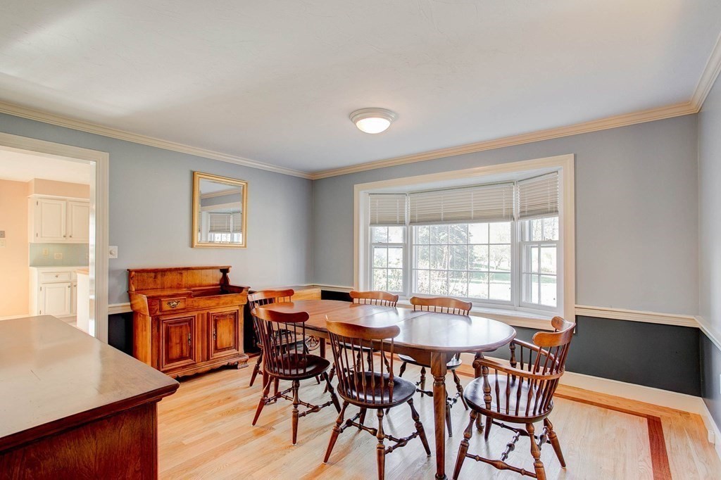 51 Green Road Bolton, MA 01740 - Photo 6 of 25 a dining room with furniture and wooden floor