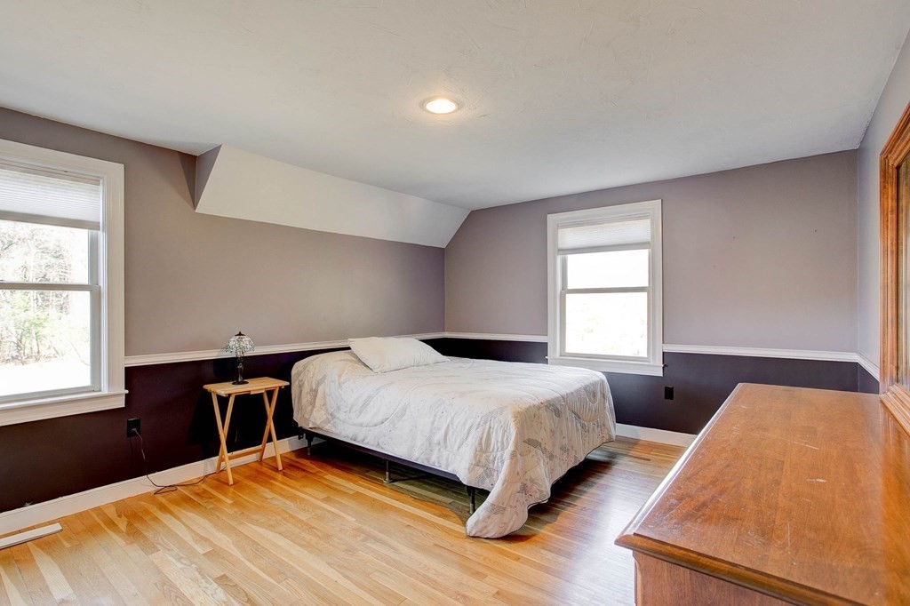 51 Green Road Bolton, MA 01740 - Photo 10 of 25 a bedroom with a bed and a window